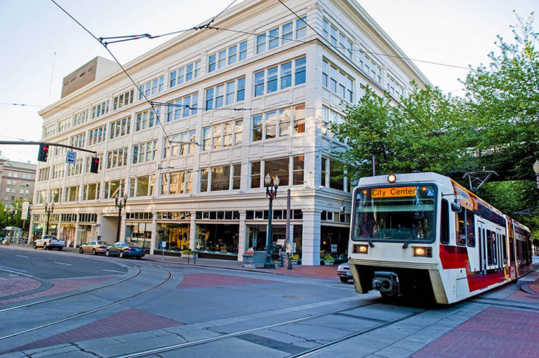 Public transit passes by downtown in Portland, OR