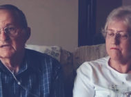 Dale and his wife sitting on the couch