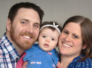 Mike Mattmuller — a Simmons Hanly Conroy client — and his wife holding their young daughter