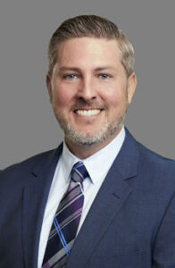 Professional headshot of Donald P. Blydenburgh