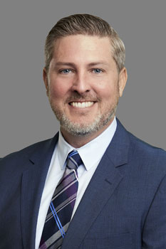 Professional headshot of Donald P. Blydenburgh