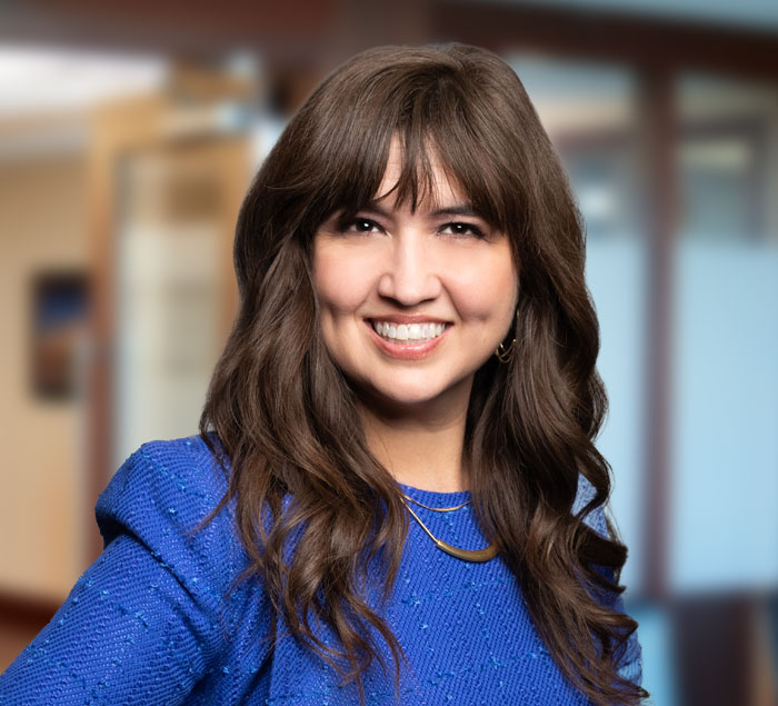 Attorney Megan Williams standing in the firm office