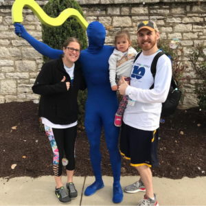 Mike Mattmuller and family at miles for meso with mascot