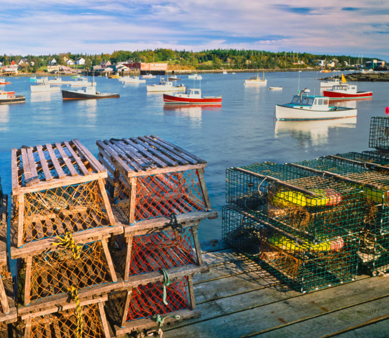 Lobster traps on the dock at a harbor in Maine