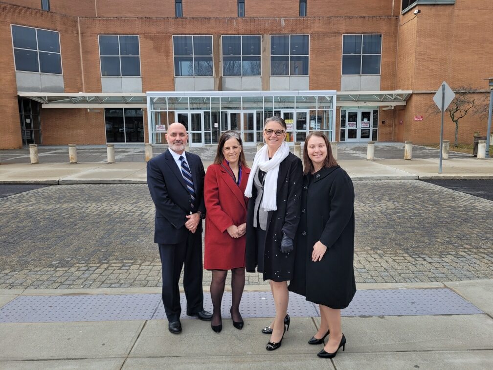 Jayne Conroy and others outside the courthouse after the landmark opioid trial verdict