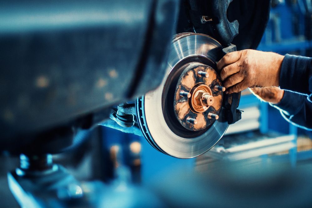 Mechanic working on brakes