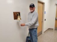Johnl Stahl ringing the cancer free bell