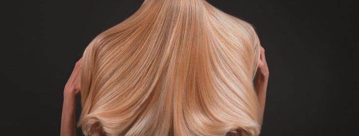 beautiful chemically straightened hair cascading down a woman's back