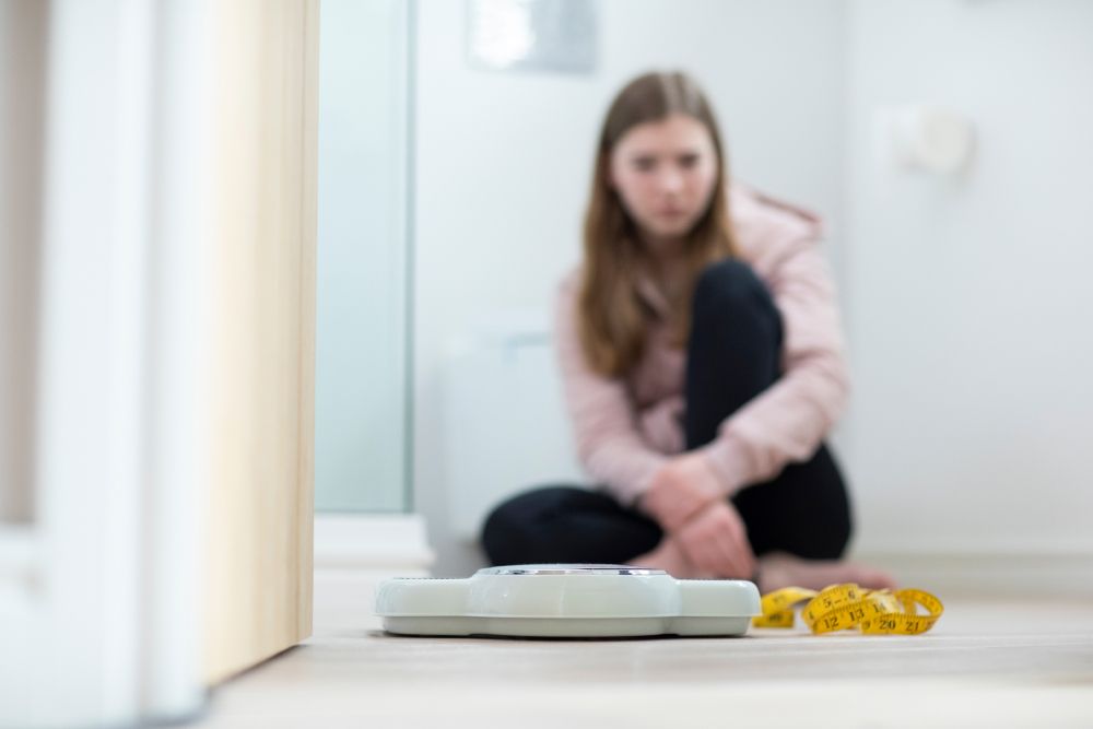 teen struggling with an eating disorder