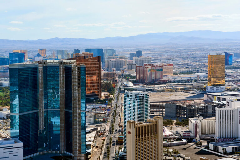 The city of Las Vegas with mountains visible in the distance