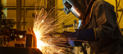 a welder working and sparks flying