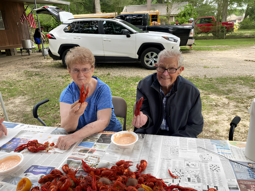 Ira, a Simmons Hanly Conroy patient, eating crawfish