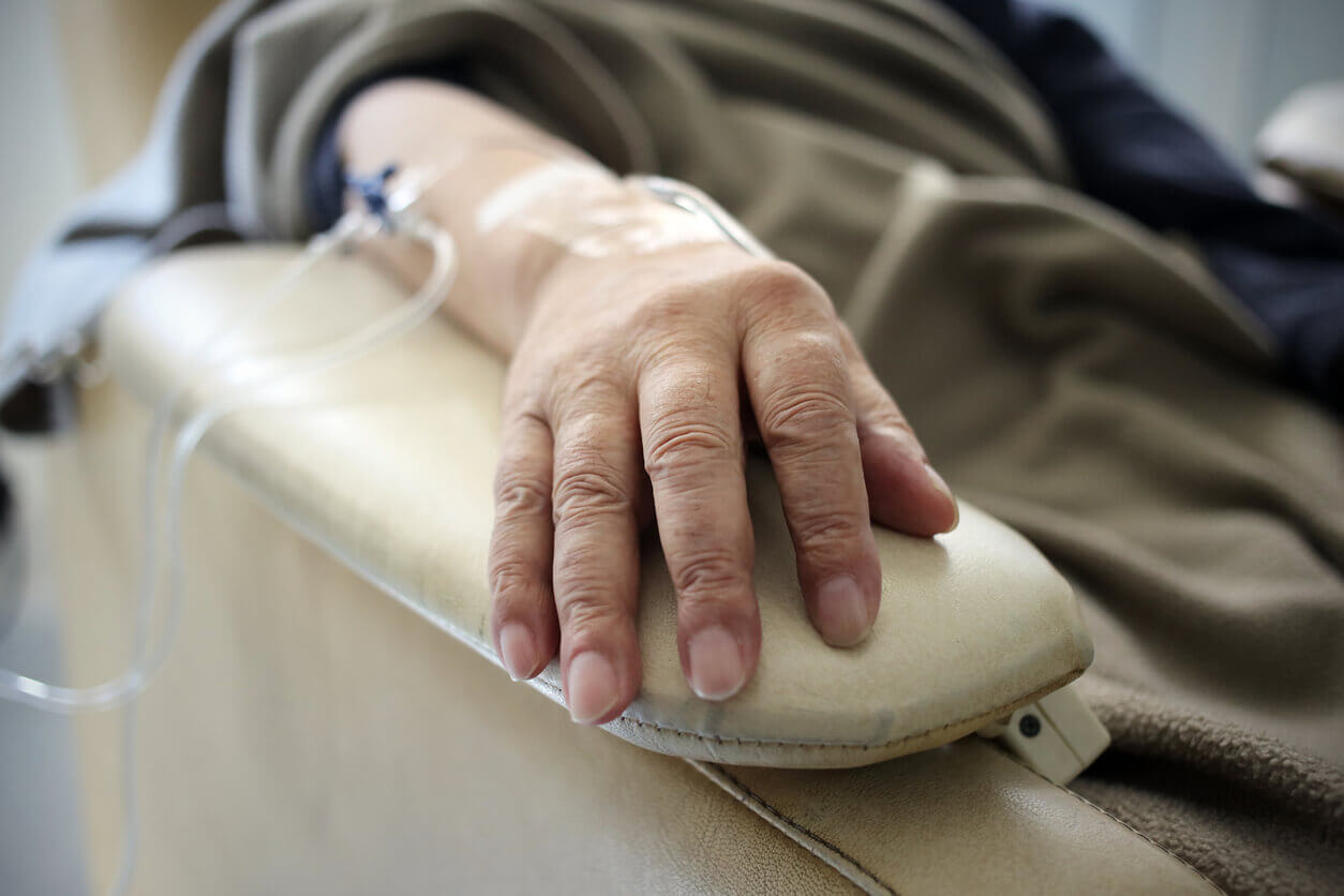 A patient's arm is shown with an iv for chemotherapy
