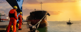 Longshoreman near a boat at a port
