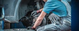 Mechanic working on a tire well