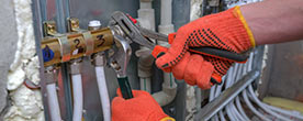 A pipefitter at work