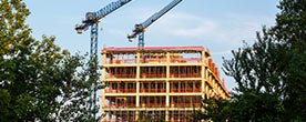 Cranes over a building construction site