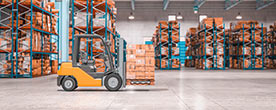 Forklift carrying boxes