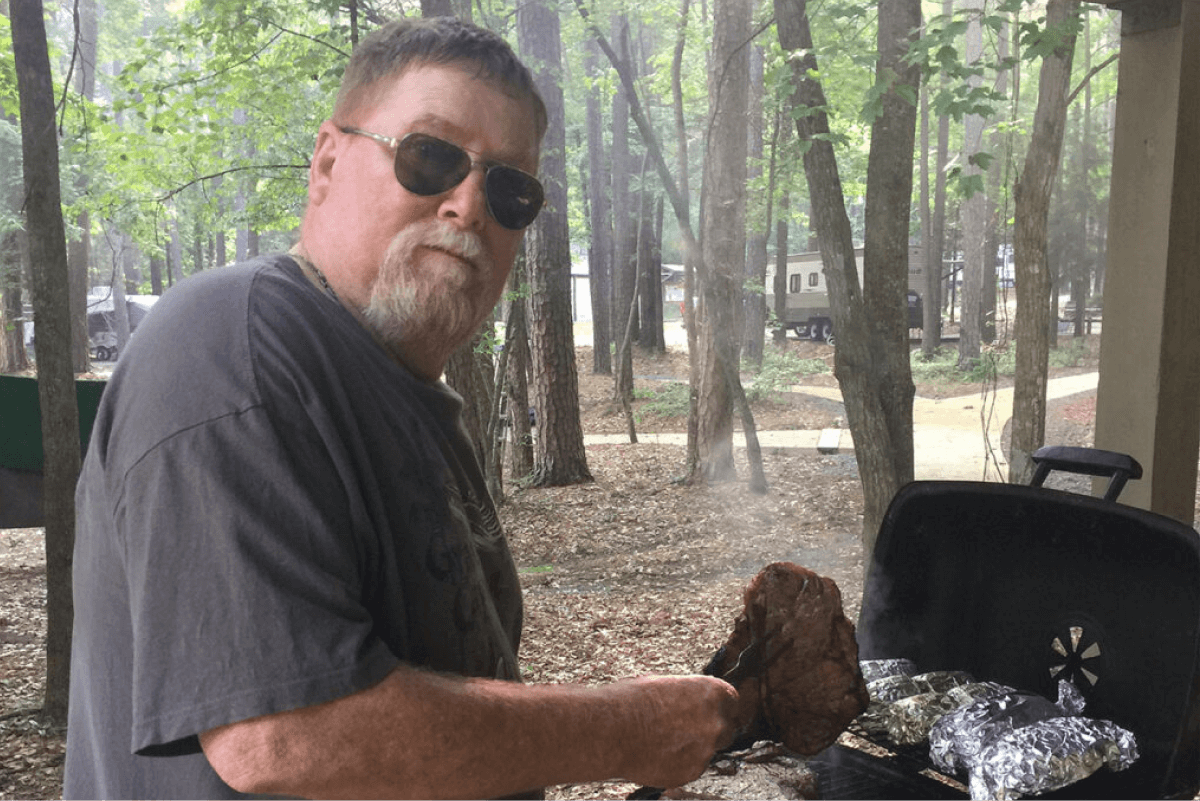 Joe grilling outside