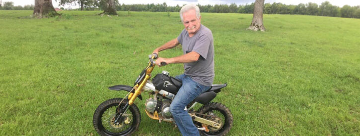 Sid Toney riding on a dirt bike