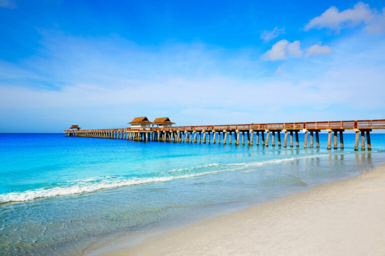A boardwalk at the beach in Naples, FL