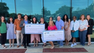 SHC Foundation Golf Tournament presents the donation check