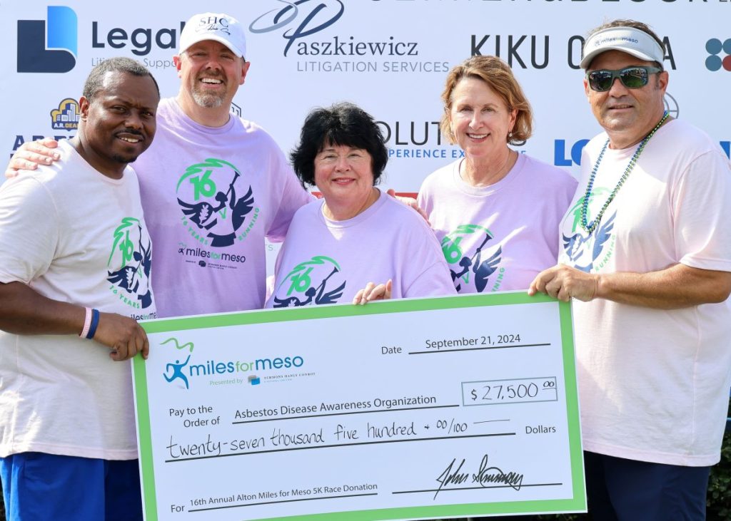 Linda Reinstein at Miles for Meso as she receives a donation check to ADAO